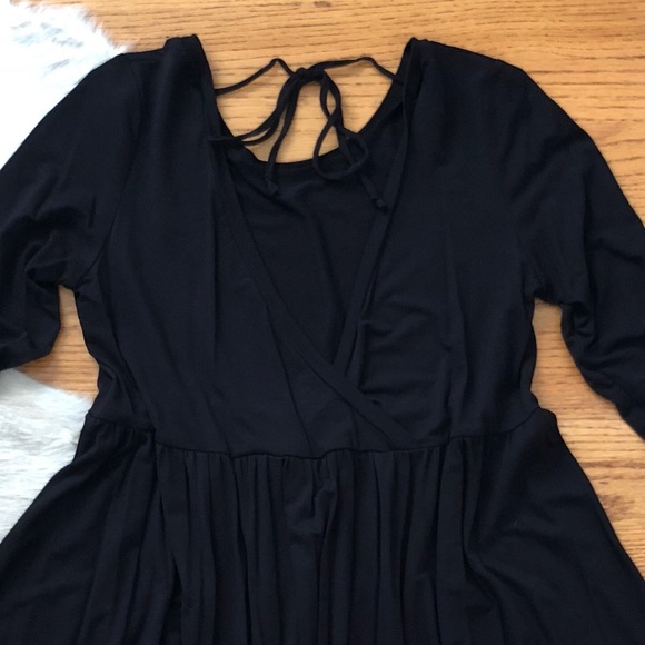 Rounded Neck, Loose Fit, Peplum Style Top - Picture 4 of 7